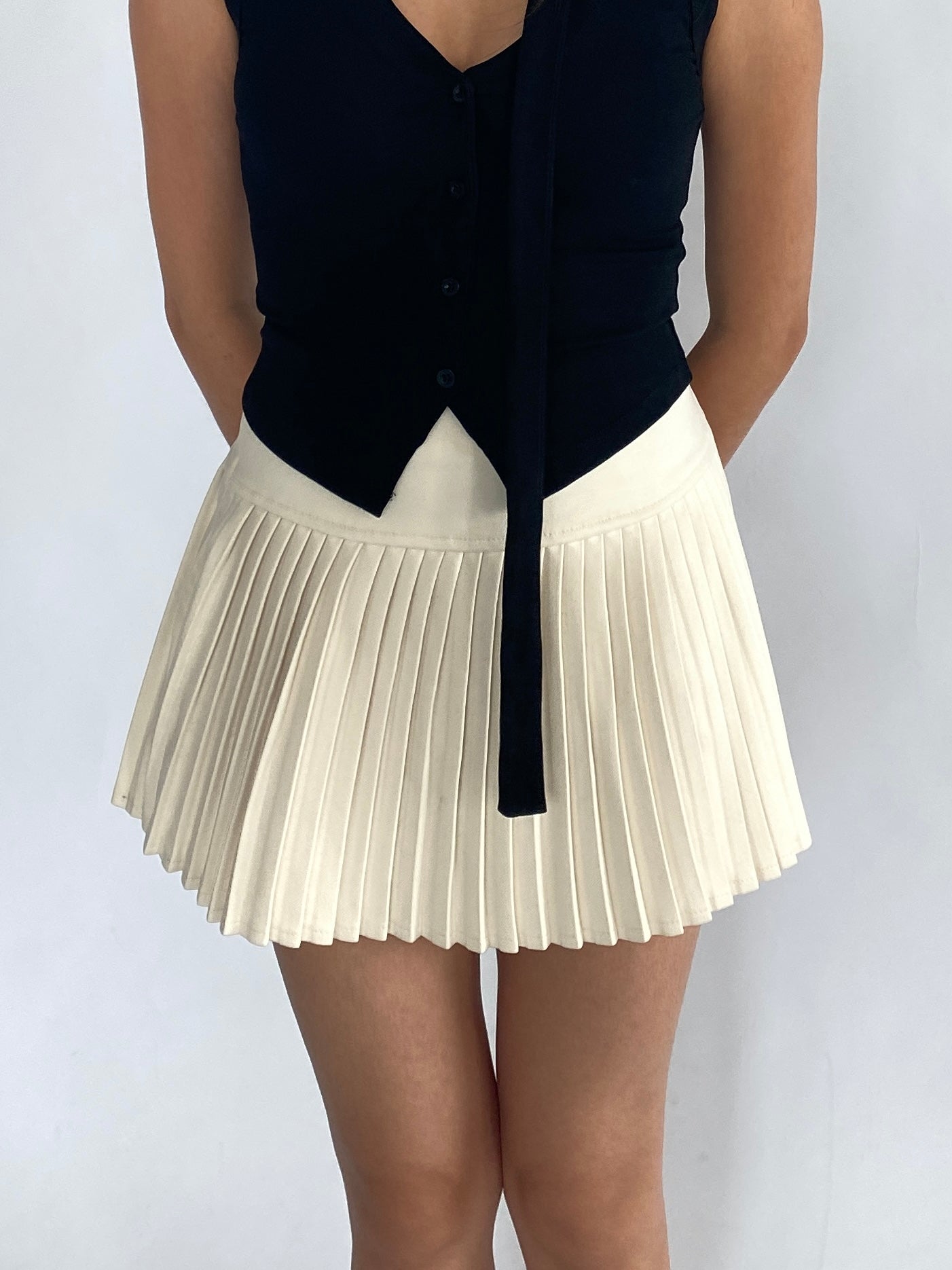 Juliette pleated mini skort in cream